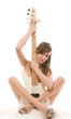 Young adult girl with white guitar Young adult girl with white guitar