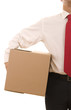 Business man holding a carboard box isolated on white