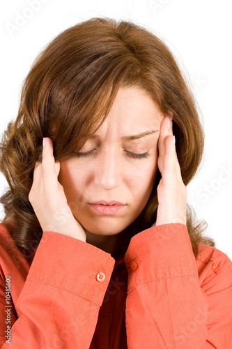 Photo: Young woman with migraine isolated on white background Young woman with migraine isolated on white background