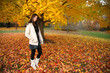 Beautiful young woman in autumn park.