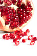 Pomegranates seeds against white