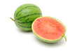 Fresh watermelon halved in isolated white background