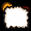 a piece of burning paper with jagged edges