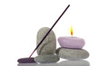 Candle and River Stones on background