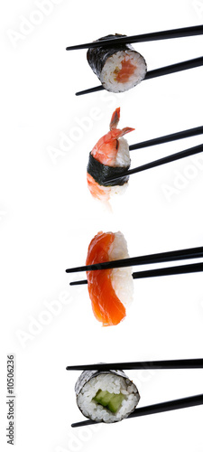 Stock Photo: Sushi with chopsticks isolated on white