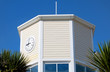Old wooden tower in British holiday resort with clock