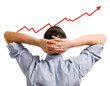 Young businessman looking at his growing share