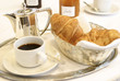 Small can of coffee, croissants and jam