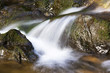 Water cascading over rocks, (blurred motion)