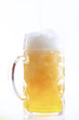Pouring beer into glass, close-up