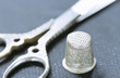 Scissor and thimble, close-up