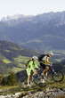 Austria, Tirol, couple riding bicycle