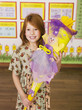Girl holding schoolcone