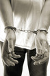 criminal man arrested wearing handcuffs