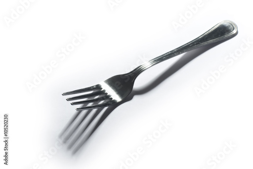 Photo: fork on white background fork on white background