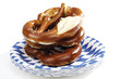Pretzels on paper plate, close-up