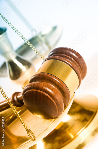 Wooden justice gavel and block with brass Wooden justice gavel and block with brass