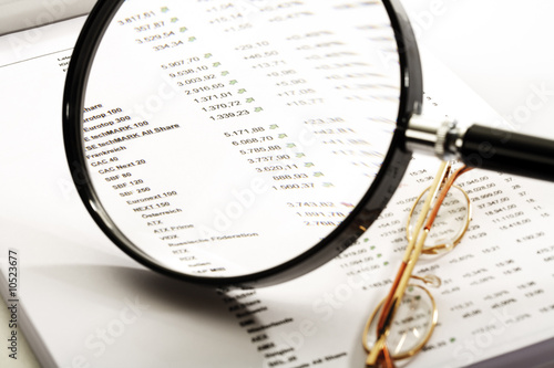 Photo: Magnifying glass and quotations sheet Magnifying glass and quotations sheet