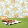 Wieners in plate with dollop of mustard and roll