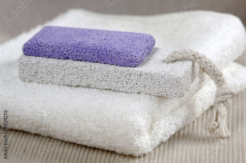 Photo: Pumice Stone on towel, close-up Pumice Stone on towel, close-up