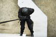 SWAT Team Officer Rappelling from Building