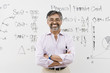 Scientist Standing in Front of Whiteboard