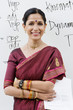 Indian Businesswoman in Front of Whiteboard
