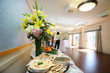 Banquet room. Food and flowers on the table. Banquet room. Food and flowers on the table.