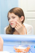Teen girl in bathroom for your design
