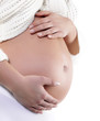 Image of pregnant woman touching her belly with hands