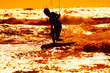 kite boarder action with sunset..