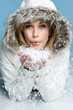 Woman Blowing Snow