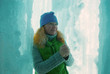 Woman in ice grotto