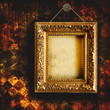 Grungy tattered wallpaper with empty picture frame Grungy tattered wallpaper with empty picture frame