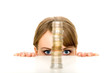 Foto: Woman looking at stack of coins Woman looking at stack of coins