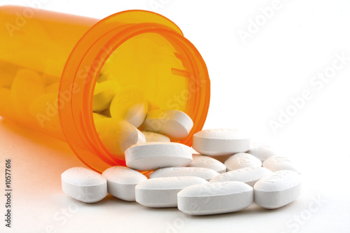 Photo: Pills spilling out Pills spilling out