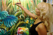 A female artist painting in her studio A female artist painting in her studio