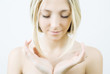 Beautiful blonde girl with closed eyes.