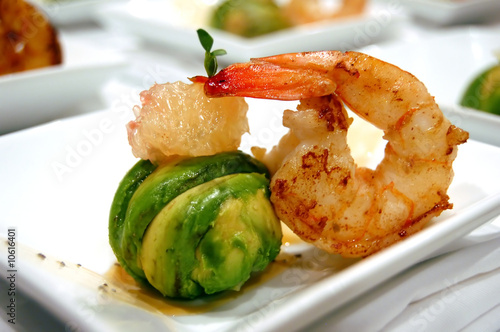 Photo: Avocado ball stuffed with pink shrimp fried basmati rice Avocado ball stuffed with pink shrimp fried basmati rice