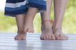 Two chilrden's feet.