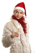 Young beautiful woman in white fur coat and red hat