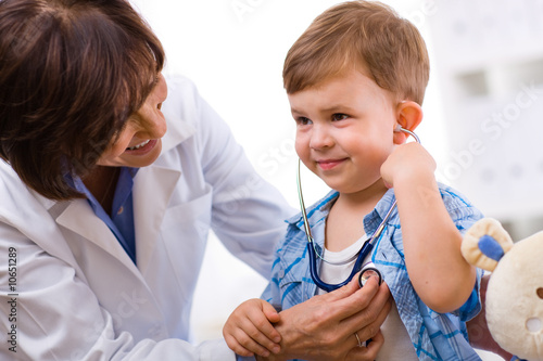 Photo: Doctor examining child Doctor examining child