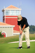 golfer striking
