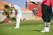golfer striking