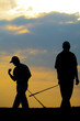 golfs play in the sunset