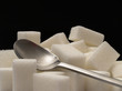 Sugar cubes and tea-spoon Sugar cubes and tea-spoon
