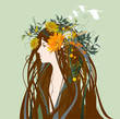 Beautiful woman with flowers in the hair