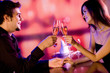 Young couple celebrating with champagne together Young couple celebrating with champagne together