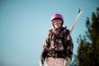 Photo: Girl with skis on back Girl with skis on back