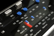 detail of portable analogue radio showing tuning dial